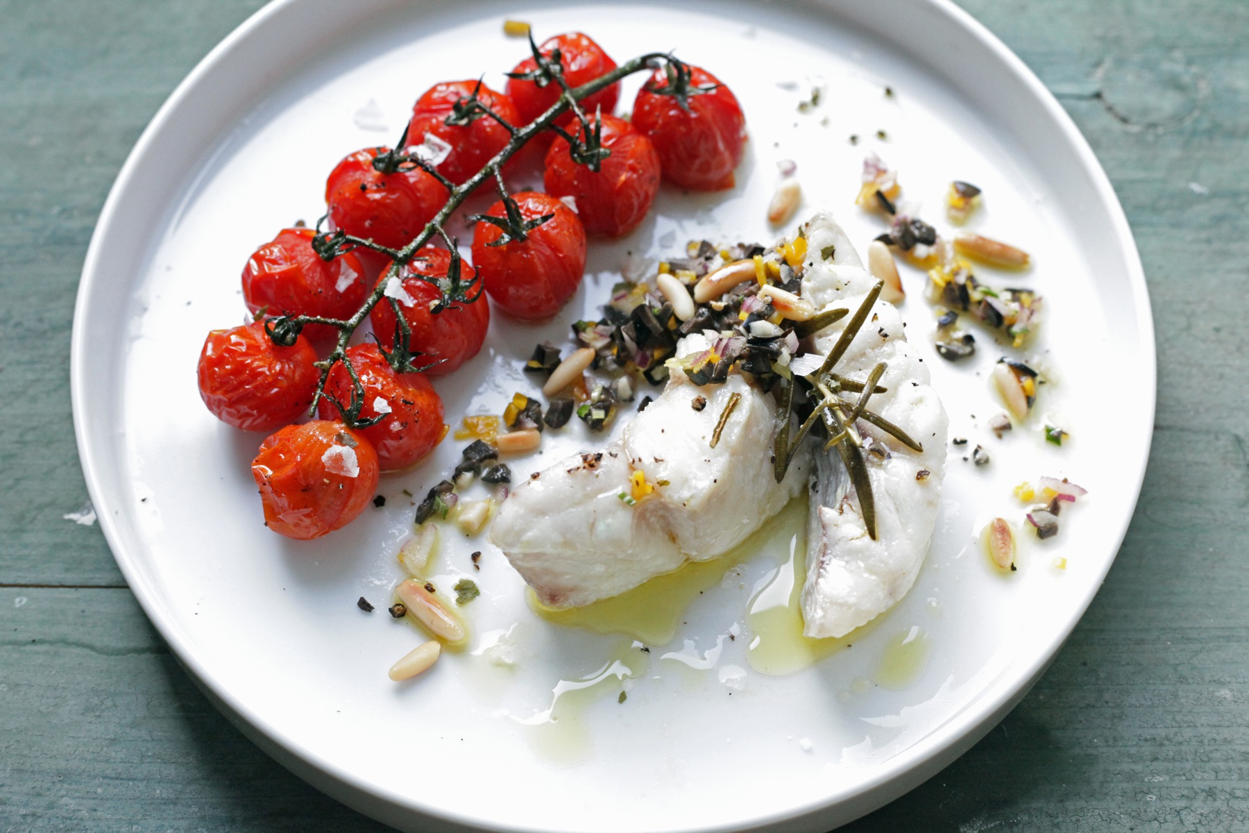 In olive oil conferier redfish with olive gremolata and baked tomatoes | GourmetGuerilla.com